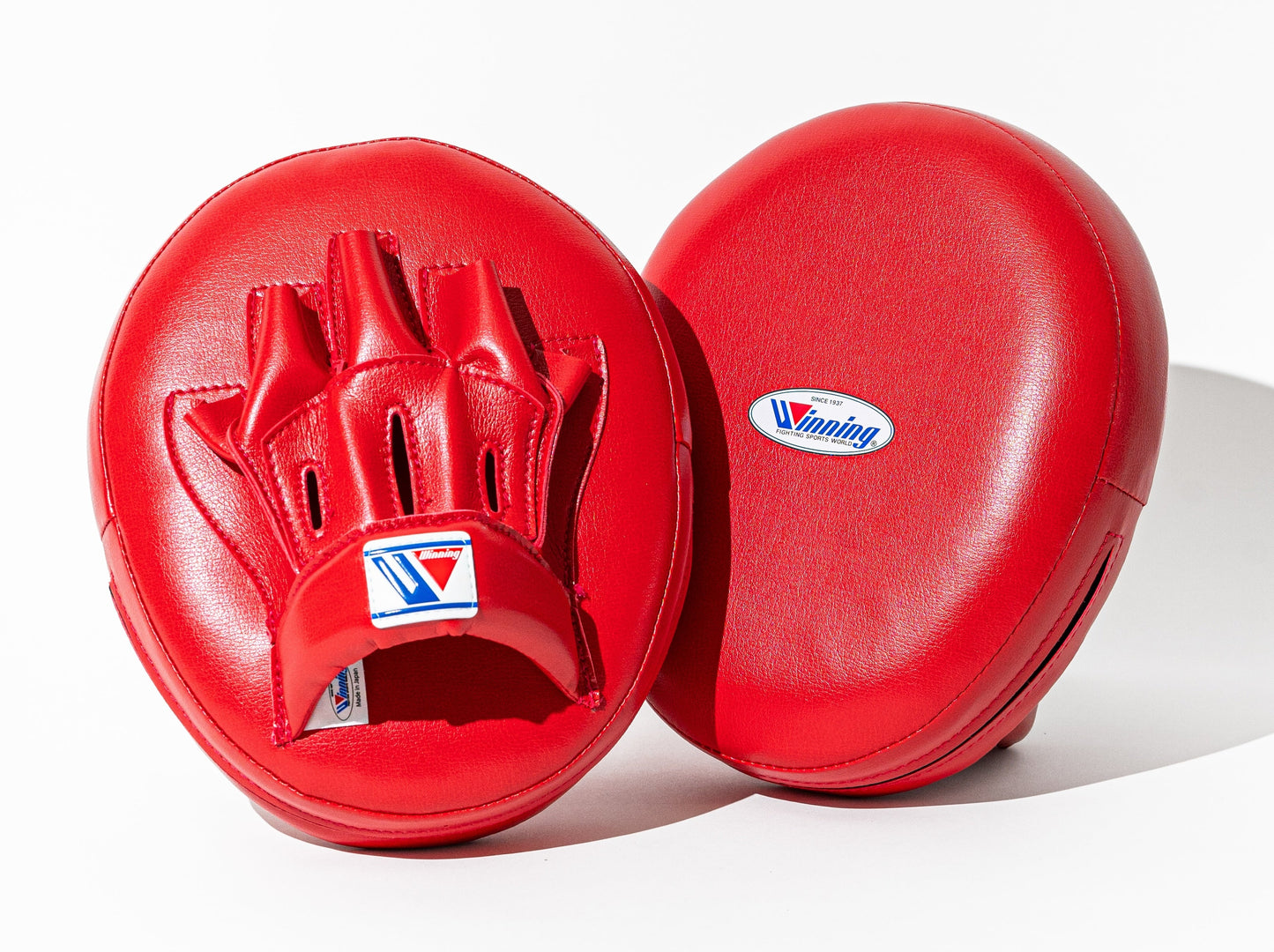 Winning High Grade Type Punch Mitts Red